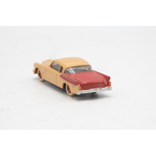 3229 - Dinky Toys 169 Studebaker Golden Hawk, two tone red and beige body, missing end flaps one end, corre... 