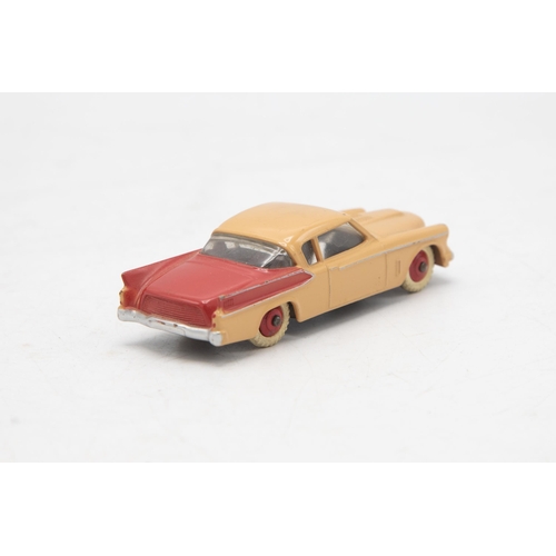 3229 - Dinky Toys 169 Studebaker Golden Hawk, two tone red and beige body, missing end flaps one end, corre... 