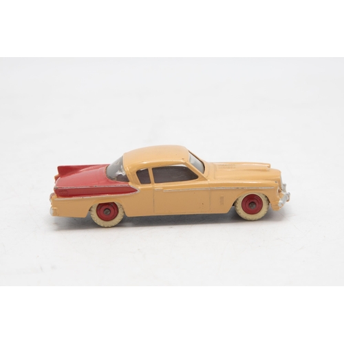 3229 - Dinky Toys 169 Studebaker Golden Hawk, two tone red and beige body, missing end flaps one end, corre... 