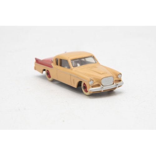 3229 - Dinky Toys 169 Studebaker Golden Hawk, two tone red and beige body, missing end flaps one end, corre... 