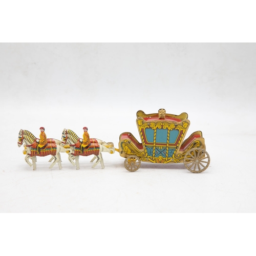 3240 - Wells Brimtoy 'The Coronation Coach', 1953, comprising of Tinplate Coach, 4 x Horse Team with 2 x Dr... 