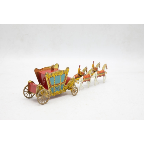 3240 - Wells Brimtoy 'The Coronation Coach', 1953, comprising of Tinplate Coach, 4 x Horse Team with 2 x Dr... 