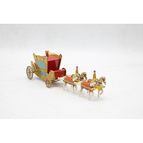 3240 - Wells Brimtoy 'The Coronation Coach', 1953, comprising of Tinplate Coach, 4 x Horse Team with 2 x Dr... 