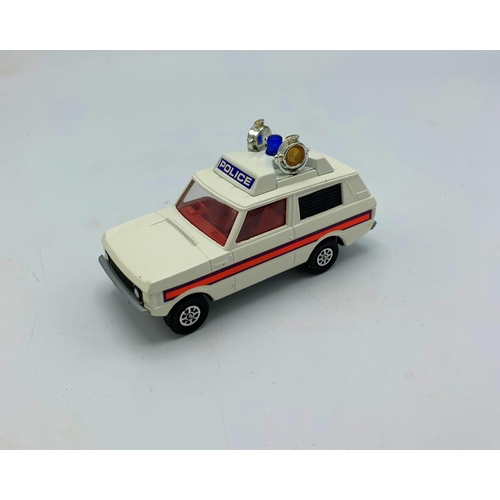 3243 - Corgi Toys 461 Police 'Vigilant' Range Rover, WHIZZWHEELS, with multiple signs, cones and waving tra... 