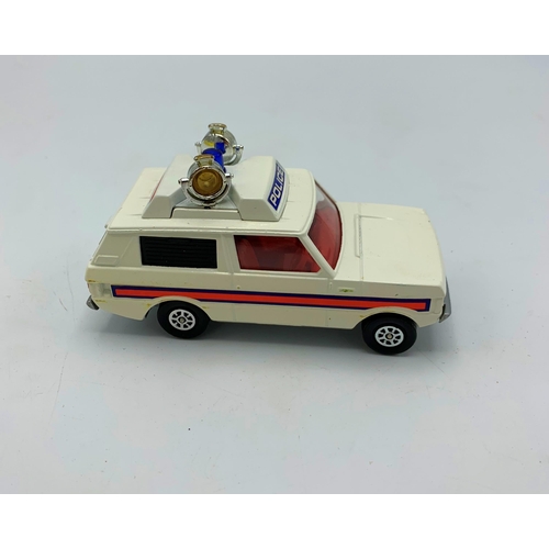 3243 - Corgi Toys 461 Police 'Vigilant' Range Rover, WHIZZWHEELS, with multiple signs, cones and waving tra... 