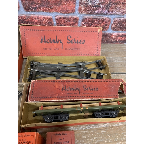 3502 - Assortment of boxed Hornby 0 gauge to include boxed Hornby No. 2 Timber Wagon L.M.S. , No. 1 Buffer,... 