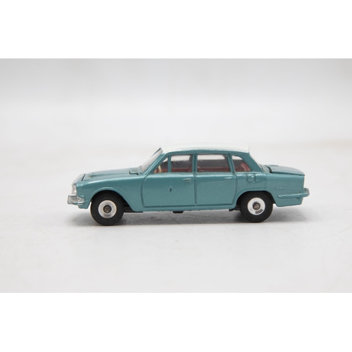 3245 - Dinky Toys 135 Triumph 2000, turquoise and white roof, with luggage, mint and boxed