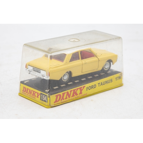 3253 - Dinky Toys 154 Ford Taunus 17M, crack on one face of plastic case, mint and boxed