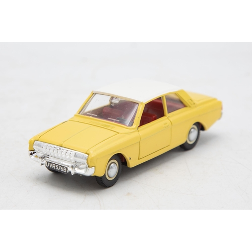 3253 - Dinky Toys 154 Ford Taunus 17M, crack on one face of plastic case, mint and boxed