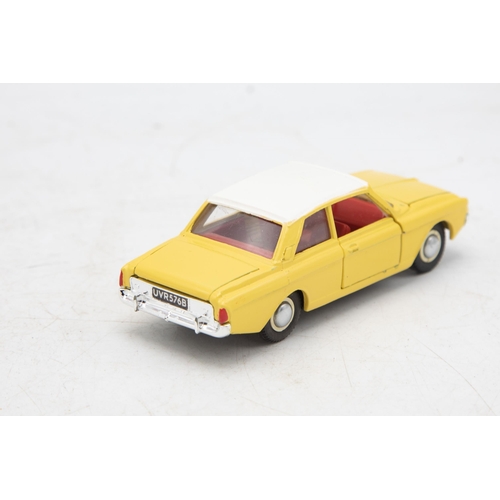 3253 - Dinky Toys 154 Ford Taunus 17M, crack on one face of plastic case, mint and boxed