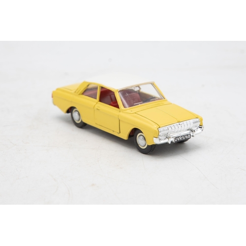 3253 - Dinky Toys 154 Ford Taunus 17M, crack on one face of plastic case, mint and boxed