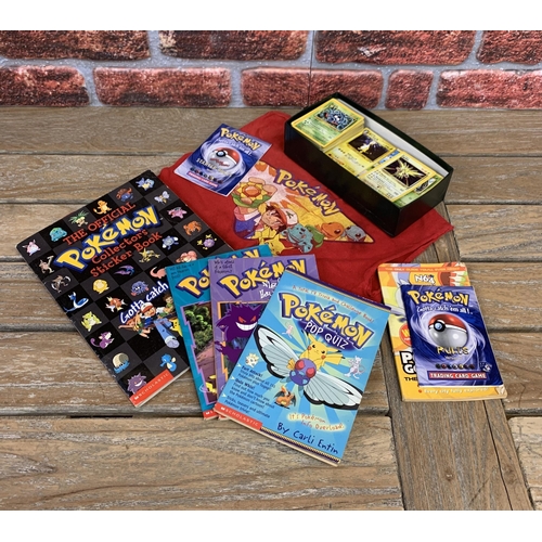 3351 - Assortment of vintage Pokemon collectables to include cards, book and a child's Pokemon T-shirt