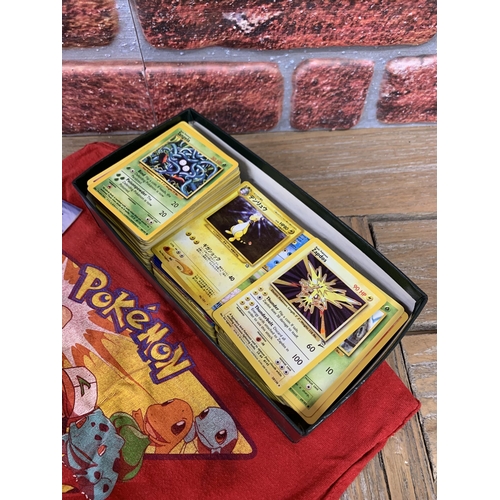 3351 - Assortment of vintage Pokemon collectables to include cards, book and a child's Pokemon T-shirt