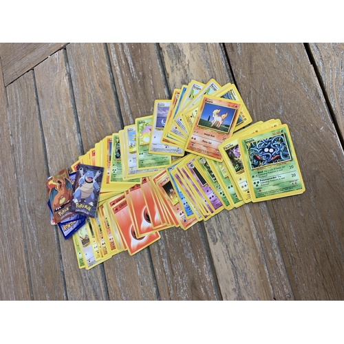 3351 - Assortment of vintage Pokemon collectables to include cards, book and a child's Pokemon T-shirt