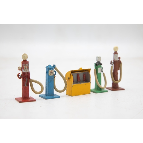 3267 - Dinky Toys Petrol Pumps No. 49, with Oil Bin, post-war version (1946 on) virtually mint 4 pumps with... 