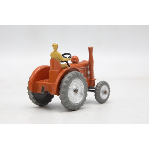 3269 - Dinky Toys 301 Field-Marshall Tractor, scarce version with silver painted hubs, stunning model mint ... 