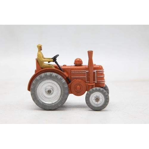 3269 - Dinky Toys 301 Field-Marshall Tractor, scarce version with silver painted hubs, stunning model mint ... 