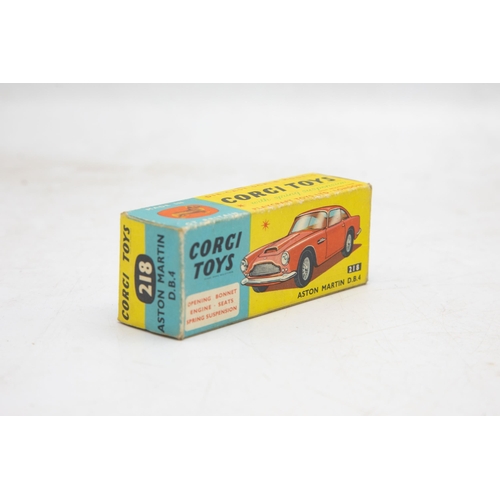 3283 - Corgi Toys 218 Aston Martin D.B.4, yellow, cast spoked wheels, very near mint, and boxed