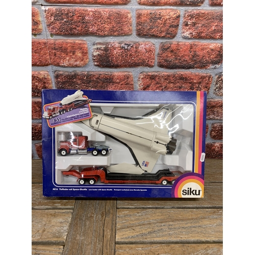 3359 - Quantity of boxed Siku 1:55 scale model vehicles to include haulage, electronic crane and space shut... 