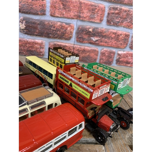 3369 - Quantity of die cast model busses to include Dinky, Corgi and Oxwich examples (12)