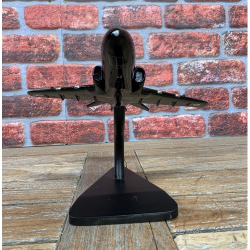 3372 - Bravo Delta Models - carved mahogany model of a XX295 Hawk plane with display stand