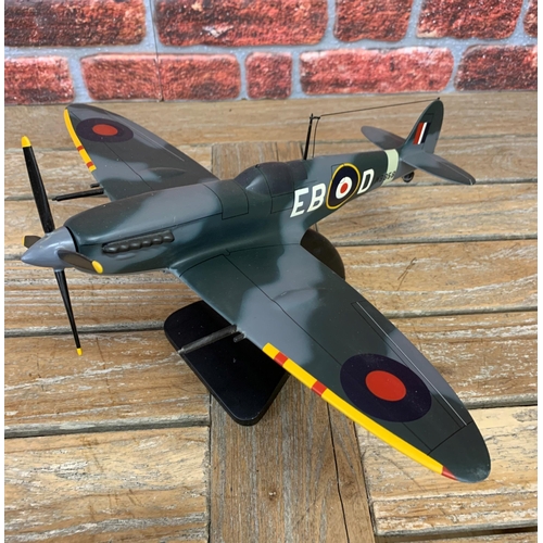 3379 - Bravo Delta Models - carved mahogany model of a Supermarine Spitfire Mk XII plane with display stand