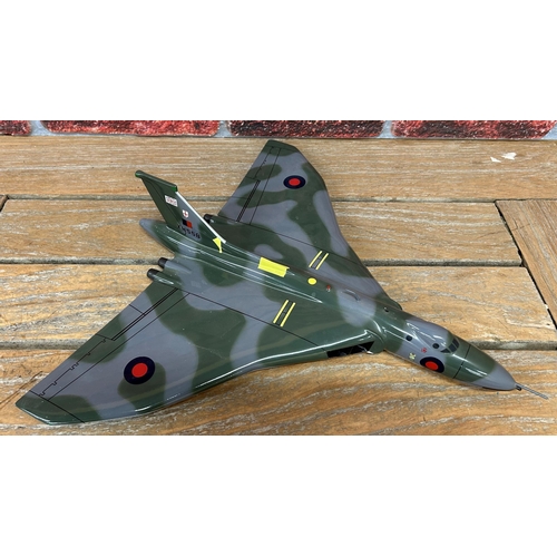 3387 - Bravo Delta Models - carved mahogany model of a Avro Vulcan XH558 plane