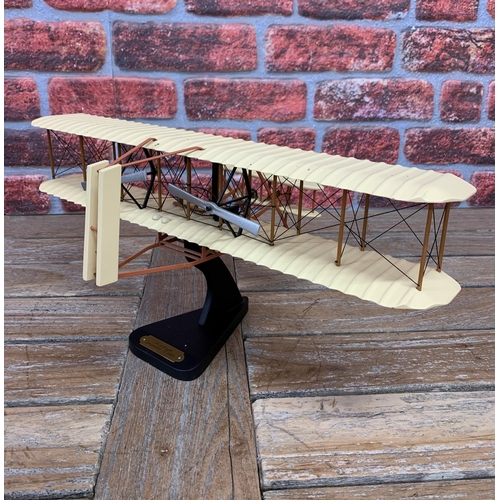 3404 - Bravo Delta Models - carved mahogany model of Wright Brothers plane on original stand with plaque