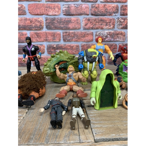 3418 - Quantity of vintage action figures to include He-Man, Ghostbusters, Thunderbirds etc