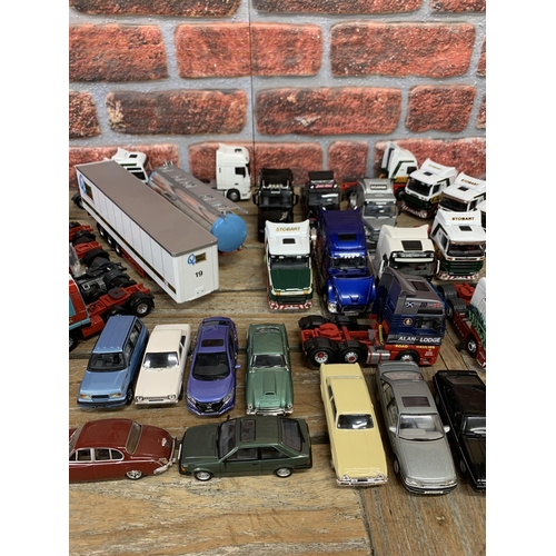 3431 - Large quantity of unboxed die cast haulage vehicles, cars and coaches