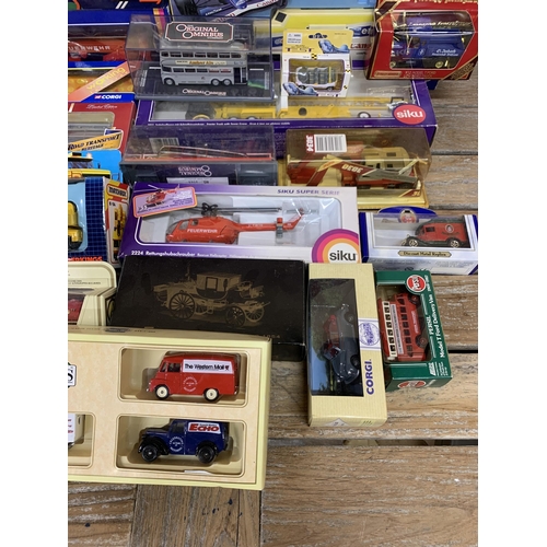 3439 - Large collection of boxed die cast vehicles to include Matchbox, Corgi and Siku examples