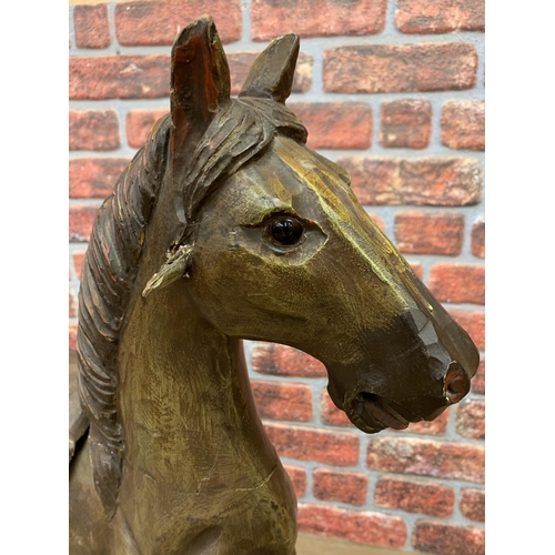 3472 - Vintage pull along carved wooden horse, glass eyes with leather saddle and horse hair tail, L82cm H7... 