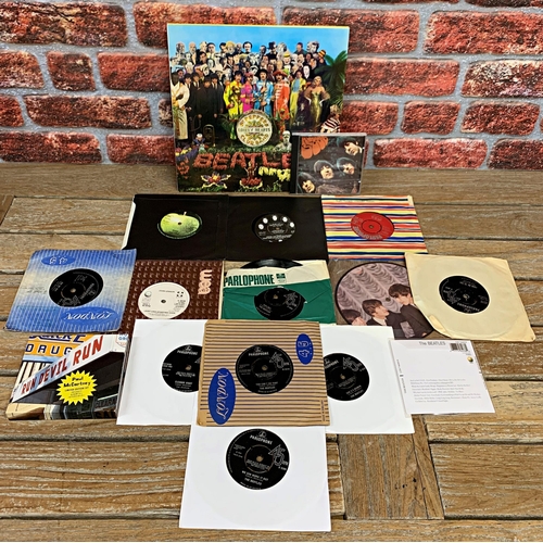 3608 - Assortment of Beetles related pieces to include album, singles and CD's, with rare Paul McCartney 'R... 