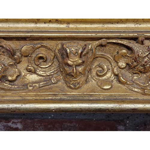 2440 - Attractive carved gilt gesso 19th century Baroque style mirror, the frame carved with fruit and foli... 