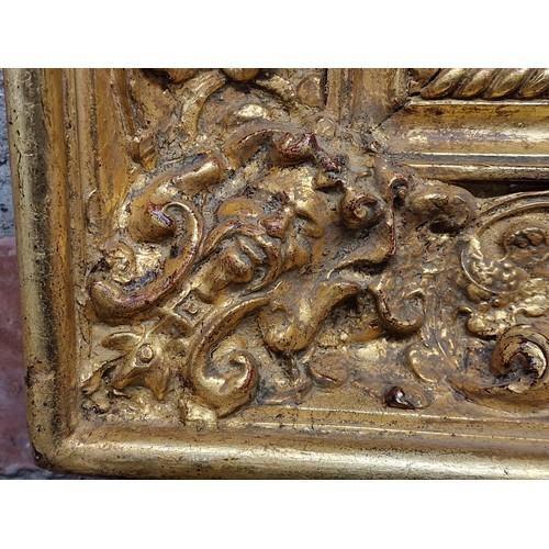 2440 - Attractive carved gilt gesso 19th century Baroque style mirror, the frame carved with fruit and foli... 