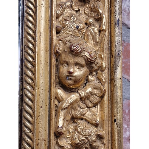 2440 - Attractive carved gilt gesso 19th century Baroque style mirror, the frame carved with fruit and foli... 