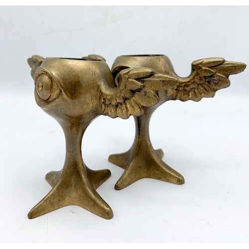 255 - Pair of Mark Brazier-Jones (1956-) bronze Guardian Egg Cup candlesticks, H 12cm (2)