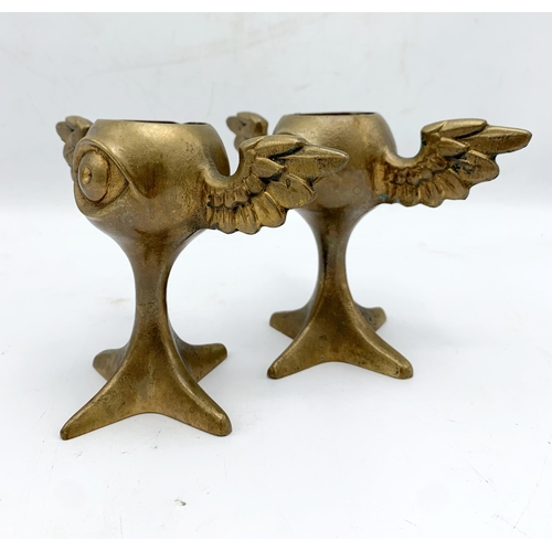 255 - Pair of Mark Brazier-Jones (1956-) bronze Guardian Egg Cup candlesticks, H 12cm (2)