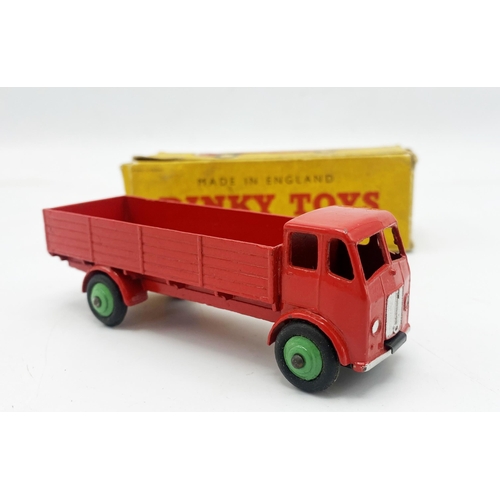 3341 - Dinky Toys 420 Forward Control Lorry, scarce version in red with green wheel hubs, original tyres, M... 