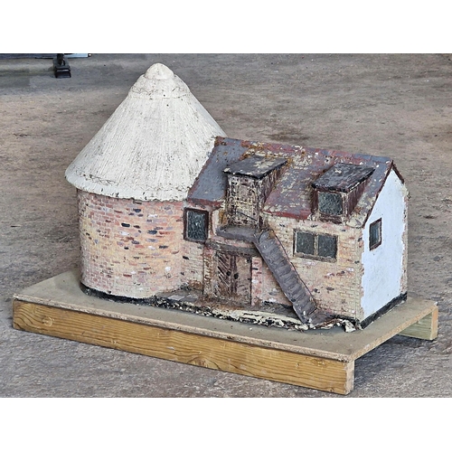 1310 - Large reconstituted stone Kent Oast House model, from a Sussex model village L 104cm x W 48cm x H 74... 