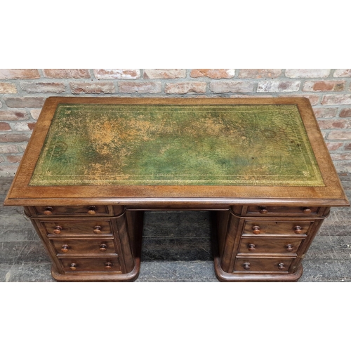 1002 - Victorian mahogany twin pedestal desk fitted with an arrangement of nine drawers, the top with inset... 