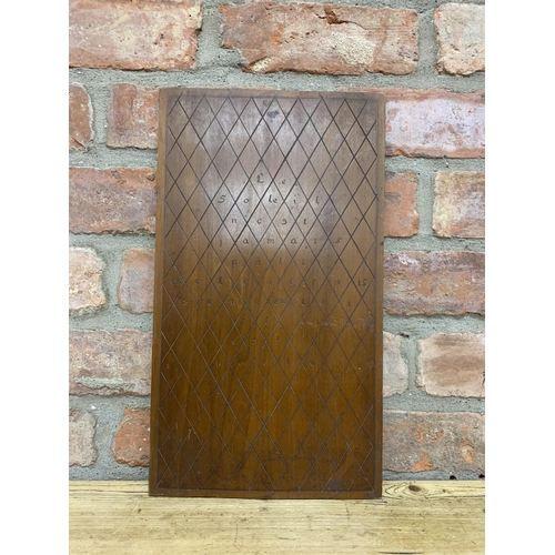 60 - Early 19th century French fruitwood panel, incised with diaper pattern and inscirbed 'le soleil nest... 