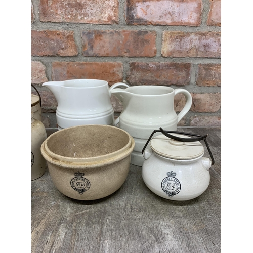 67 - Quantity of mixed antique creamware kitchen ceramics to include banded jugs, salt tub, jars and bowl... 