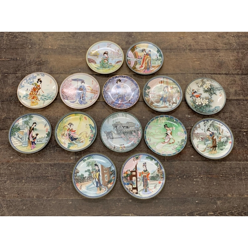 82 - Collection of fourteen hand painted 'Japanese Beauty's' porcelain plates with original boxes and cer... 