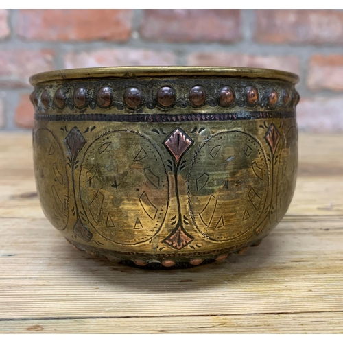 126 - Persian brass bowl with copper studded rim and lotus flower base, H 7cm x D 11cm