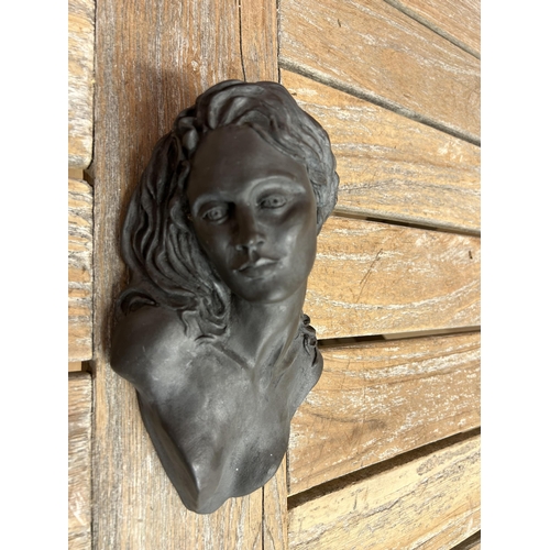 6 - Pair of cast resin wall plaques, candles holders in the shape of an attractive woman