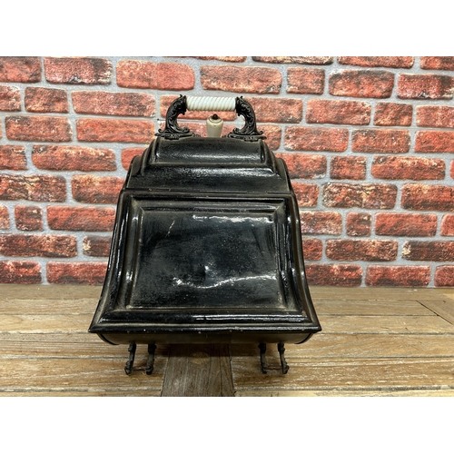 18 - Victorian black tin coal scuttle with original scoop having white ceramic finish to handles