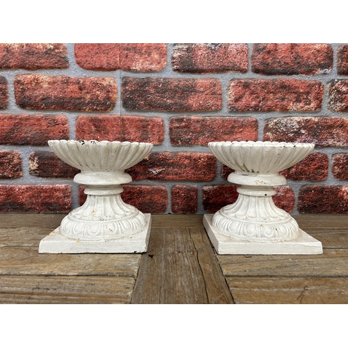 40 - Pair of miniature white cast iron garden urns with stepped base and scalloped rim finish, H 19cm (2)