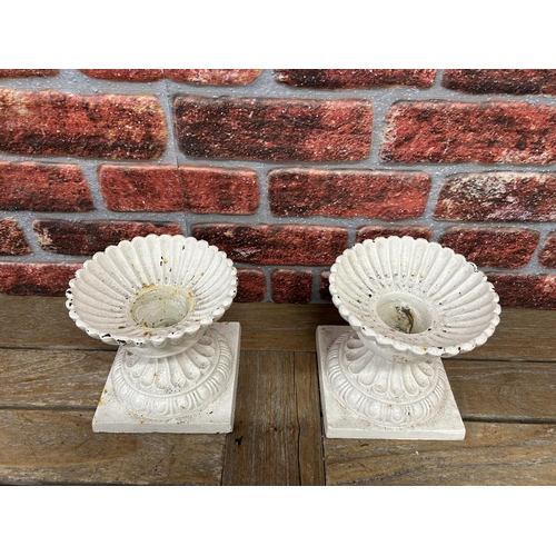 40 - Pair of miniature white cast iron garden urns with stepped base and scalloped rim finish, H 19cm (2)