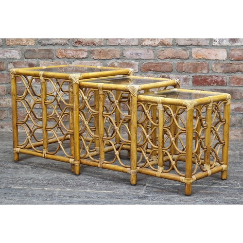 1067 - Contemporary bamboo nest of three tables with glass tops, H 55cm x W 50cm (largest)